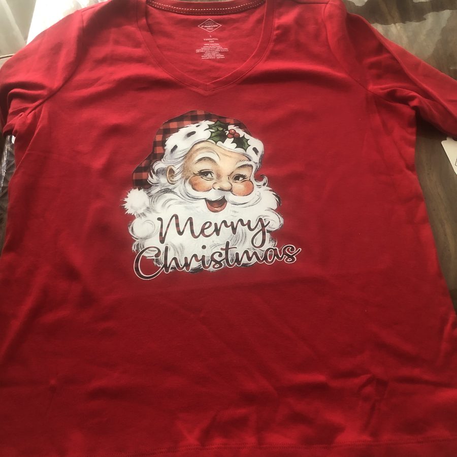 Red shirt printed with a vintage Santa and the words Merry Christmas